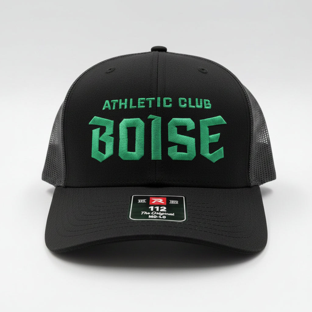 Black hat with green text